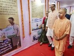 Chief minister Yogi Adityanath with deputy CM Brajesh Pathak during launch of Sewa Pakhwada to mark the 75th birthday of Prime Minister Narendra Modi, in Lucknow, Wednesday. (PTI Photo) Chief minister Yogi Adityanath with deputy CM Brajesh Pathak during launch of Sewa Pakhwada to mark the 75th birthday of Prime Minister Narendra Modi, in Lucknow, Wednesday. (PTI Photo)