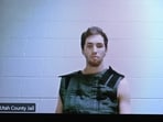 Tyler Robinson, 22, the suspect in the shooting death of Charlie Kirk, appears by camera before Judge Tony Graf 