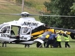 A police officer is loaded into a Medevac helicopter after a shooting incident in York County's North Codorus Township