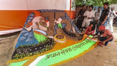 A sand artist working on a sculpture of Prime Minister Narendra Modi on his birthday in Varanasi on Wednesday. (PTI PHOTO) A sand artist working on a sculpture of Prime Minister Narendra Modi on his birthday in Varanasi on Wednesday. (PTI PHOTO)