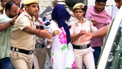 The woman driver of the BMW car, Gaganpreet Kaur, 38, in custody of Delhi Police after her arrest (ANI Grab ) The woman driver of the BMW car, Gaganpreet Kaur, 38, in custody of Delhi Police after her arrest (ANI Grab )