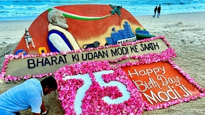 In Odisha's Puri, sand artist Sudarsan Pattnaik made a sand sculpture on the eve of Prime Minister Narendra Modi's 75th birthday, at Puri beach. (PTI) In Odisha's Puri, sand artist Sudarsan Pattnaik made a sand sculpture on the eve of Prime Minister Narendra Modi's 75th birthday, at Puri beach. (PTI)