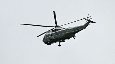 One of three helicopter's in US President Donald Trump entourage flies over Windsor Castle, in Windsor, on September 17, 2025, as the US President arrives for a second State Visit to the UK. (AFP) One of three helicopter's in US President Donald Trump entourage flies over Windsor Castle, in Windsor, on September 17, 2025, as the US President arrives for a second State Visit to the UK. (AFP)