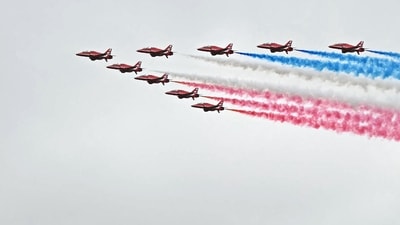 The Red Arrows aerobatic display team fly past over a Beating Retreat, at Windsor Castle, in Windsor, on September 17, 2025, during the US President's second State Visit. US President Donald Trump arrived in Britain for an unprecedented second State Visit, with the UK government rolling out a royal red carpet welcome to win over the mercurial leader. (Photo by Paul ELLIS / AFP) (AFP) The Red Arrows aerobatic display team fly past over a Beating Retreat, at Windsor Castle, in Windsor, on September 17, 2025, during the US President's second State Visit. US President Donald Trump arrived in Britain for an unprecedented second State Visit, with the UK government rolling out a royal red carpet welcome to win over the mercurial leader. (Photo by Paul ELLIS / AFP) (AFP)