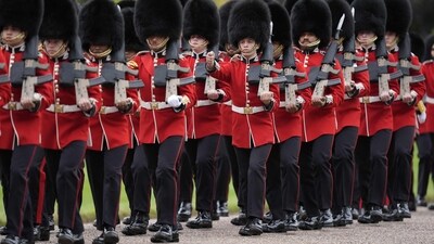 Armed Forces personnel line the route ahead of the Carriage Procession, in Windsor, on September 17, 2025, during US President Donald Trump's second State Visit to the UK. US President Donald Trump arrived in Britain on Tuesday for an unprecedented second state visit, with the UK government rolling out a royal red carpet welcome to win over the mercurial leader. (Photo by Andrew Matthews / POOL / AFP) (AFP) Armed Forces personnel line the route ahead of the Carriage Procession, in Windsor, on September 17, 2025, during US President Donald Trump's second State Visit to the UK. US President Donald Trump arrived in Britain on Tuesday for an unprecedented second state visit, with the UK government rolling out a royal red carpet welcome to win over the mercurial leader. (Photo by Andrew Matthews / POOL / AFP) (AFP)