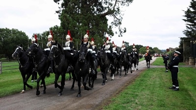 Members of the Household Cavalry Mounted Regiment form up, ahead of a horse-drawn carriage procession through the grounds of Windsor Castle, in Windsor, on September 17, 2025, during US President Donald Trump's second State Visit to the UK. US President Donald Trump arrived in Britain on Tuesday for an unprecedented second state visit, with the UK government rolling out a royal red carpet welcome to win over the mercurial leader. (Photo by Toby Melville / POOL / AFP) (AFP) Members of the Household Cavalry Mounted Regiment form up, ahead of a horse-drawn carriage procession through the grounds of Windsor Castle, in Windsor, on September 17, 2025, during US President Donald Trump's second State Visit to the UK. US President Donald Trump arrived in Britain on Tuesday for an unprecedented second state visit, with the UK government rolling out a royal red carpet welcome to win over the mercurial leader. (Photo by Toby Melville / POOL / AFP) (AFP)