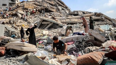 People inspect for salvage the rubble of the Unknown Soldier Tower, after it was destroyed by overnight Israeli bombardment, in the Rimal neighbourhood of Gaza City on September 15, 2025. (Omar al-Qattaa/AFP) People inspect for salvage the rubble of the Unknown Soldier Tower, after it was destroyed by overnight Israeli bombardment, in the Rimal neighbourhood of Gaza City on September 15, 2025. (Omar al-Qattaa/AFP)