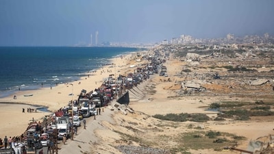 Displaced Palestinians move with their belongings southwards on a road in the Nuseirat refugee camp area in the central Gaza Strip following renewed Israeli evacuation orders for Gaza City. (Eyad Baba/AFP) Displaced Palestinians move with their belongings southwards on a road in the Nuseirat refugee camp area in the central Gaza Strip following renewed Israeli evacuation orders for Gaza City. (Eyad Baba/AFP)