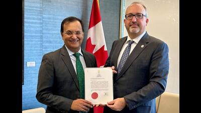 India’s High Commissioner-designate to Ottawa Dinesh Patnaik (left) presenting a copy of his credentials to Chief of Protocol of Canada Sebastien Carriere. (Credit: High Commission of India, Ottawa)