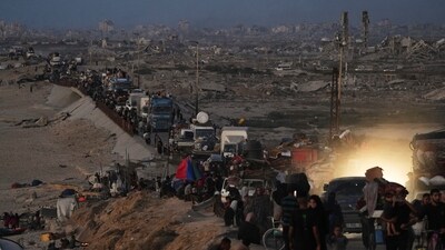 Displaced Palestinians were seen fleeing northern Gaza along the coastal road toward the south, as Israel announced an expanded operation in Gaza City (AP) Displaced Palestinians were seen fleeing northern Gaza along the coastal road toward the south, as Israel announced an expanded operation in Gaza City (AP)
