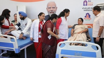 Delhi chief minister Rekha Gupta and environment minister Manjinder Singh Sirsa donate blood during a camp organised as part of Sewa Sankalp Walk organised in Delhi today. (PTI) Delhi chief minister Rekha Gupta and environment minister Manjinder Singh Sirsa donate blood during a camp organised as part of Sewa Sankalp Walk organised in Delhi today. (PTI)