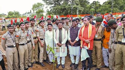 Odisha chief minister Mohan Charan Majhi with NCC cadets during sapling plantation in Bhubaneswar. (PTI) Odisha chief minister Mohan Charan Majhi with NCC cadets during sapling plantation in Bhubaneswar. (PTI)