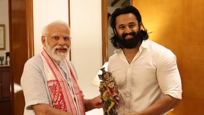 Unni Mukundan poses with Prime Minister Narendra Modi. Unni Mukundan poses with Prime Minister Narendra Modi.