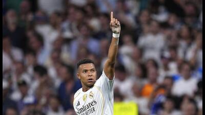 Real Madrid's Kylian Mbappe celebrates after scoring his side's second goal during a Champions League against Marseille. (AP) Real Madrid's Kylian Mbappe celebrates after scoring his side's second goal during a Champions League against Marseille. (AP)