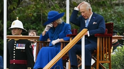 Britain's King Charles III (R) and Britain's Queen Camilla (L) share a joke as they sit with US President Donald Trump (unseen) and US First Lady Melania Trump (unseen) watching the Beating Retreat military ceremony on the East Lawn at Windsor Castle, in Windsor, on September 17, 2025, during the US president's second State Visit. (AFP) Britain's King Charles III (R) and Britain's Queen Camilla (L) share a joke as they sit with US President Donald Trump (unseen) and US First Lady Melania Trump (unseen) watching the Beating Retreat military ceremony on the East Lawn at Windsor Castle, in Windsor, on September 17, 2025, during the US president's second State Visit. (AFP)