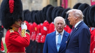 President Donald Trump and Britain's King Charles III review the Guard of Honour after the arrival at Windsor Castle in Windsor, England, Wednesday, Sept. 17, 2025.(AP Photo/Kirsty Wigglesworth, Pool) (AP) President Donald Trump and Britain's King Charles III review the Guard of Honour after the arrival at Windsor Castle in Windsor, England, Wednesday, Sept. 17, 2025.(AP Photo/Kirsty Wigglesworth, Pool) (AP)