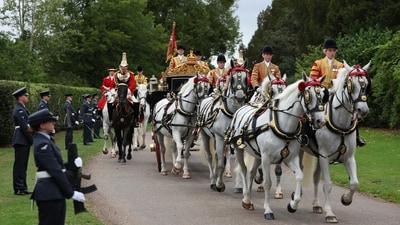 Britain's King Charles III and President Donald Trump travel in The Irish State Coach during a horse-drawn procession towards Windsor Castle in Windsor, England, Wednesday Sept. 17, 2025. (Adrian Dennis/Pool Photo via AP) (AP) Britain's King Charles III and President Donald Trump travel in The Irish State Coach during a horse-drawn procession towards Windsor Castle in Windsor, England, Wednesday Sept. 17, 2025. (Adrian Dennis/Pool Photo via AP) (AP)