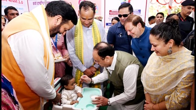 Union health minister JP Nadda and Haryana chief minister Nayab Singh Saini launching the Poshan Abhiyaan in Rohtak on Wednesday. Also present are cooperation minister Arvind Sharma, health minister Aarti Singh Rao. (Manoj Dhaka/HindustanTimes) Union health minister JP Nadda and Haryana chief minister Nayab Singh Saini launching the Poshan Abhiyaan in Rohtak on Wednesday. Also present are cooperation minister Arvind Sharma, health minister Aarti Singh Rao. (Manoj Dhaka/HindustanTimes)