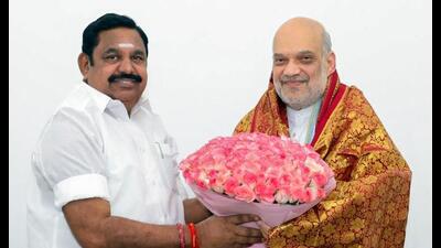 Union home minister Amit Shah being felicitated by Tamil Nadu assembly LoP and AIADMK leader Edappadi K Palaniswami during their meeting at the party headquarters in New Delhi on Tuesday. (PTI PHOTO) Union home minister Amit Shah being felicitated by Tamil Nadu assembly LoP and AIADMK leader Edappadi K Palaniswami during their meeting at the party headquarters in New Delhi on Tuesday. (PTI PHOTO)