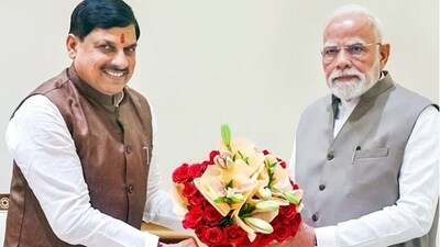 Madhya Pradesh Chief Minister Mohan Yadav greets Prime Minister Narendra Modi as he visits MP on his birthday.