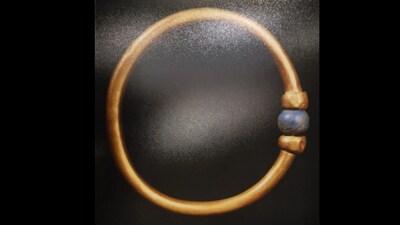The bracelet, a golden band set with spherical lapis lazuli beads, dates to the reign of Pharaoh Amenemope of the 21st Dynasty (1070–945 BC). (Facebook/tourismandantiq) The bracelet, a golden band set with spherical lapis lazuli beads, dates to the reign of Pharaoh Amenemope of the 21st Dynasty (1070–945 BC). (Facebook/tourismandantiq)