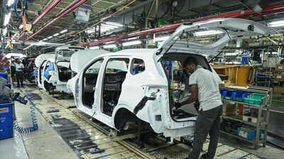 An employee works in a car assembly line at the joint manufacturing facility of Renault Nissan Automotive India, in Oragadam, an industrial suburb of Chennai (AFP FILE)