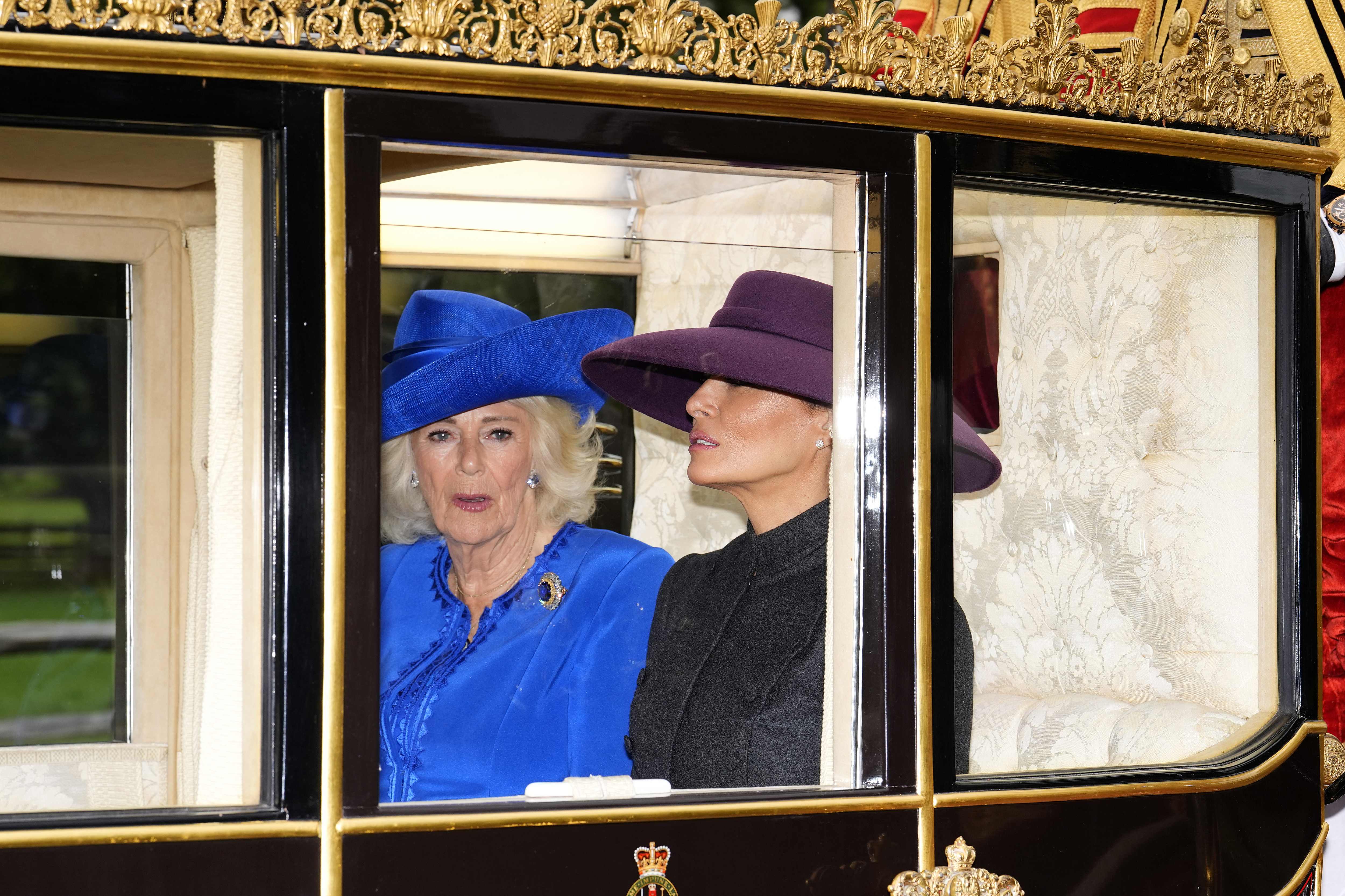Britain's Queen Camilla and US First Lady Melania Trump travel in The Scottish State Coach during a horse-drawn procession towards Windsor Castle in Windsor, on September 17, 2025, during a second State Visit. US President Donald Trump arrived in Britain for an unprecedented second State Visit, with the UK government rolling out a royal red carpet welcome to win over the mercurial leader. (Photo by Jordan Pettitt / POOL / AFP) (AFP) Britain's Queen Camilla and US First Lady Melania Trump travel in The Scottish State Coach during a horse-drawn procession towards Windsor Castle in Windsor, on September 17, 2025, during a second State Visit. US President Donald Trump arrived in Britain for an unprecedented second State Visit, with the UK government rolling out a royal red carpet welcome to win over the mercurial leader. (Photo by Jordan Pettitt / POOL / AFP) (AFP)