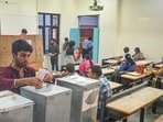A student casts his vote at Ramjas College. (Sanchit Khanna/HT Photo)