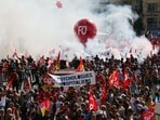 Protesters hold unions' flags and banners in Marseille, southeastern France, on September 18, 2025, during a day of nationwide strikes and protests called by unions over France's national budget. Protesters hold unions' flags and banners in Marseille, southeastern France, on September 18, 2025, during a day of nationwide strikes and protests called by unions over France's national budget.