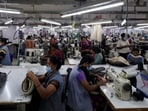 Workers sew winter garments at a Gokaldas garment facility in Bengaluru, India, September 16.(REUTERS)
