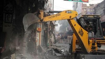 A-JCB-machine-demolishing-encroachments-during-an-anti-encroachment-drive-in-the-city-JS-Grewal-HT
