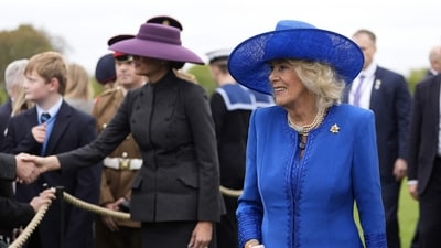 US First Lady Melania Trump (L) and Britain's Queen Camilla (R) greet members of the Armed forces after the Beating Retreat military ceremony, at Windsor Castle. (Photo by Andrew Matthews / POOL / AFP) (AFP) US First Lady Melania Trump (L) and Britain's Queen Camilla (R) greet members of the Armed forces after the Beating Retreat military ceremony, at Windsor Castle. (Photo by Andrew Matthews / POOL / AFP) (AFP)