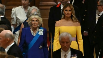 Britain's Queen Camilla (C) and US First Lady Melania Trump (R) arrive for a State Banquet at Windsor Castle, in Windsor. (Photo by ANDREW CABALLERO-REYNOLDS / POOL / AFP) (AFP) Britain's Queen Camilla (C) and US First Lady Melania Trump (R) arrive for a State Banquet at Windsor Castle, in Windsor. (Photo by ANDREW CABALLERO-REYNOLDS / POOL / AFP) (AFP)