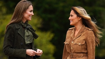 Kate Middleton, Princess of Wales and US First Lady Melania Trump tour the gardens of Frogmore Cottage on the Windsor Estate. (AFP)