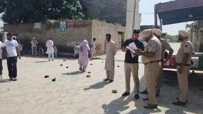 Investigation underway at Raike Kalan in Bathinda district after a police team came under a mob attack on Wednesday. (Sanjeev Kumar/HT) Investigation underway at Raike Kalan in Bathinda district after a police team came under a mob attack on Wednesday. (Sanjeev Kumar/HT)