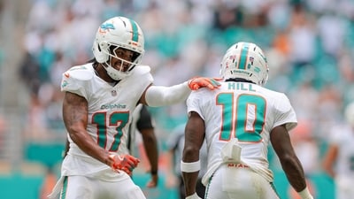 Miami Dolphins wide receiver Tyreek Hill (10) celebrates with wide receiver Jaylen Waddle (17) (IMAGN IMAGES via Reuters Connect)