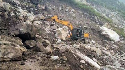 Road clearance work underway after landslide triggered heavy rains, in Kinnaur, on Thursday. (ANI) Road clearance work underway after landslide triggered heavy rains, in Kinnaur, on Thursday. (ANI)