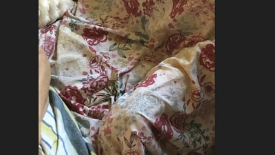 An optical illusion on Reddit featuring a couch with floral sheets went viral as users struggled to locate a hidden lighter. (Reddit/Impressive-Morning-5) An optical illusion on Reddit featuring a couch with floral sheets went viral as users struggled to locate a hidden lighter. (Reddit/Impressive-Morning-5)