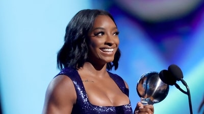 Simone Biles accepts the Best Athlete Women's Sports Award onstage during the 2025 ESPY Awards (Getty Images via AFP) Simone Biles accepts the Best Athlete Women's Sports Award onstage during the 2025 ESPY Awards (Getty Images via AFP)