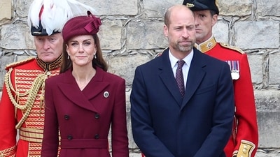 Britain's Kate welcomed the Trumps in a striking burgundy look with a netted veil. (Chris Jackson/Pool Photo via AP) (AP) Britain's Kate welcomed the Trumps in a striking burgundy look with a netted veil. (Chris Jackson/Pool Photo via AP) (AP)