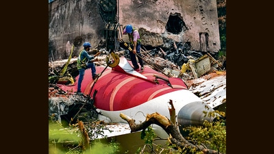 Wreckage of the crashed Air India plane, which crashed into a medical hostel and its canteen complex moments after taking off from the Sardar Vallabhbhai Patel International Airport, being lifted through a crane, in Ahmedabad, Gujarat. (PTI) Wreckage of the crashed Air India plane, which crashed into a medical hostel and its canteen complex moments after taking off from the Sardar Vallabhbhai Patel International Airport, being lifted through a crane, in Ahmedabad, Gujarat. (PTI)