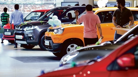 File photo of Maruti Suzuki cars inside a showroom.