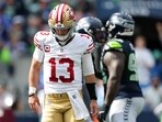 Brock Purdy #13 of the San Francisco 49ers reacts during the second quarter against the Seattle Seahawks Brock Purdy #13 of the San Francisco 49ers reacts during the second quarter against the Seattle Seahawks