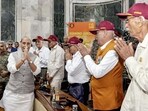 Union defence minister Rajnath Singh with veterans and families of fallen heroes of the 1965 war, at the South Block in New Delhi on Friday. (PIB)