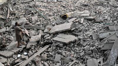 (FILES) Locals stand on the debris of destroyed structures in Muridke 30 kilometres from Lahore on May 7, 2025, after Indian strikes. (AFP) (FILES) Locals stand on the debris of destroyed structures in Muridke 30 kilometres from Lahore on May 7, 2025, after Indian strikes. (AFP)