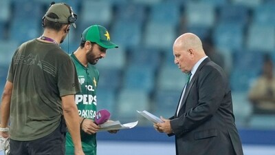 Pakistan's captain Salman Agha shares team list with match referee Andy Pycroft (AP) Pakistan's captain Salman Agha shares team list with match referee Andy Pycroft (AP)