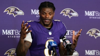 Baltimore Ravens quarterback Lamar Jackson speaks during a news conference. (AP) Baltimore Ravens quarterback Lamar Jackson speaks during a news conference. (AP)