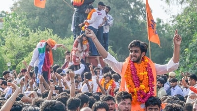 Newly Elected President of DUSU from ABVP, Aryan Maan and other winning candidates celebrate their victory in the DUSU elections, at the statue of Swami Vivekanand at DU Arts Faculty. (Raj K Raj/HT Photo) Newly Elected President of DUSU from ABVP, Aryan Maan and other winning candidates celebrate their victory in the DUSU elections, at the statue of Swami Vivekanand at DU Arts Faculty. (Raj K Raj/HT Photo)
