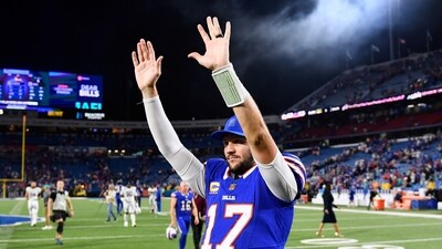 Buffalo Bills quarterback Josh Allen gestures to fans after the team's victory over the Miami Dolphins. (AP) Buffalo Bills quarterback Josh Allen gestures to fans after the team's victory over the Miami Dolphins. (AP)
