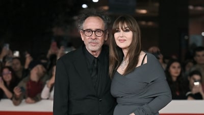 Italian actress Monica Bellucci and partner US director Tim Burton have announced their breakup with a joint statement. (AFP) Italian actress Monica Bellucci and partner US director Tim Burton have announced their breakup with a joint statement. (AFP)